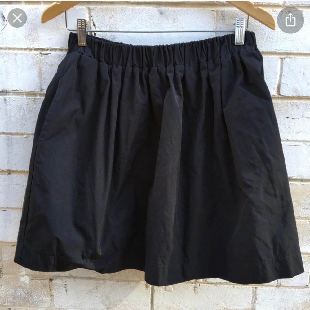 Short black full skirt